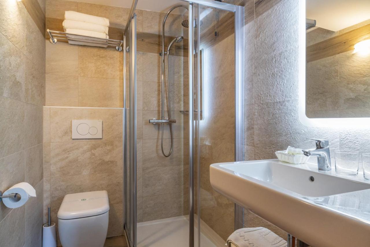 Garni Bellavista Hotel Calceranica al Lago Ngoại thất bức ảnh